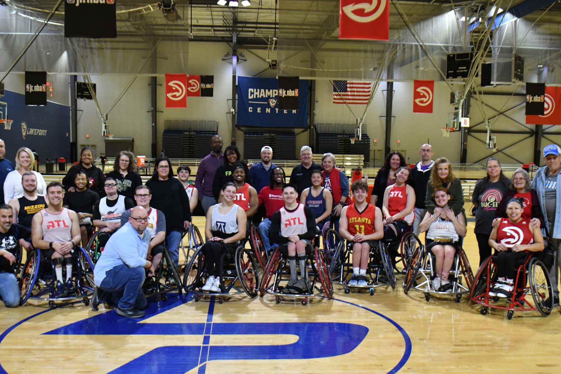 Coach training youth athlete on track